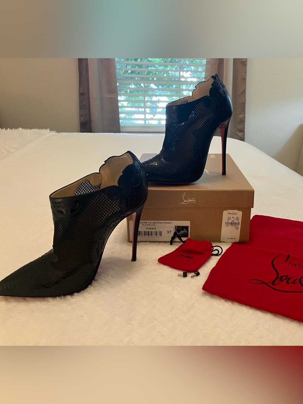 Christian Louboutin Black Laser-Cut Peep-Toe Stiletto Booties with Red Sole